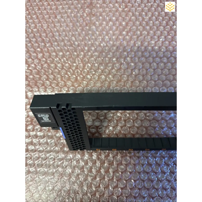 Black plastic hard drive caddy or mounting bracket with ventilation holes.