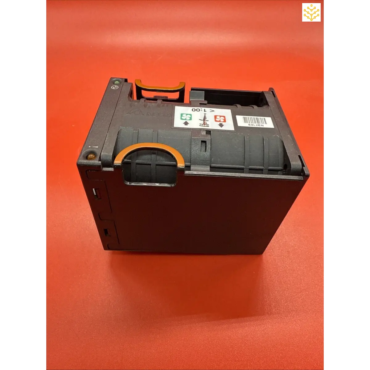 Black plastic printer ink cartridge housing unit with an orange accent.