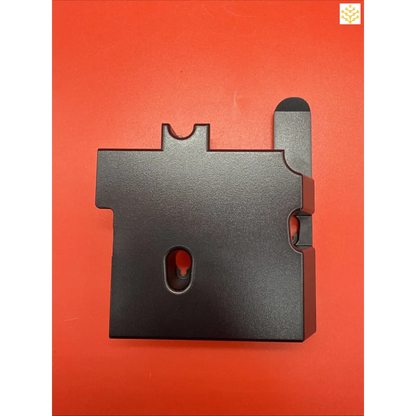 Black metal bracket or mounting plate with cutouts and a raised edge.