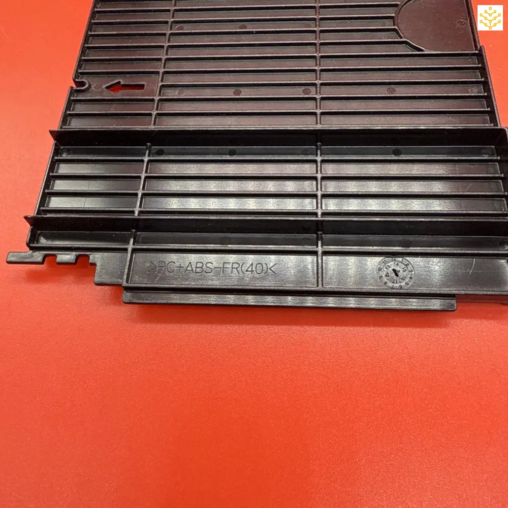 Black plastic ventilation grille with horizontal slats.