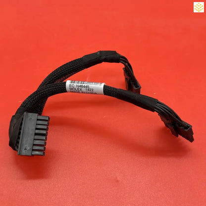 Black electrical cable harness with a plastic connector end.