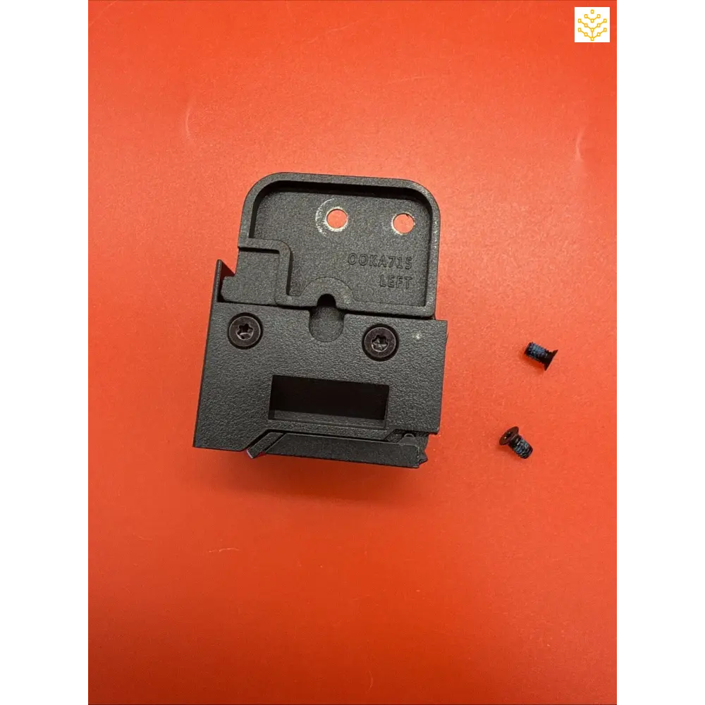 Black plastic mounting bracket with two small screws beside it.