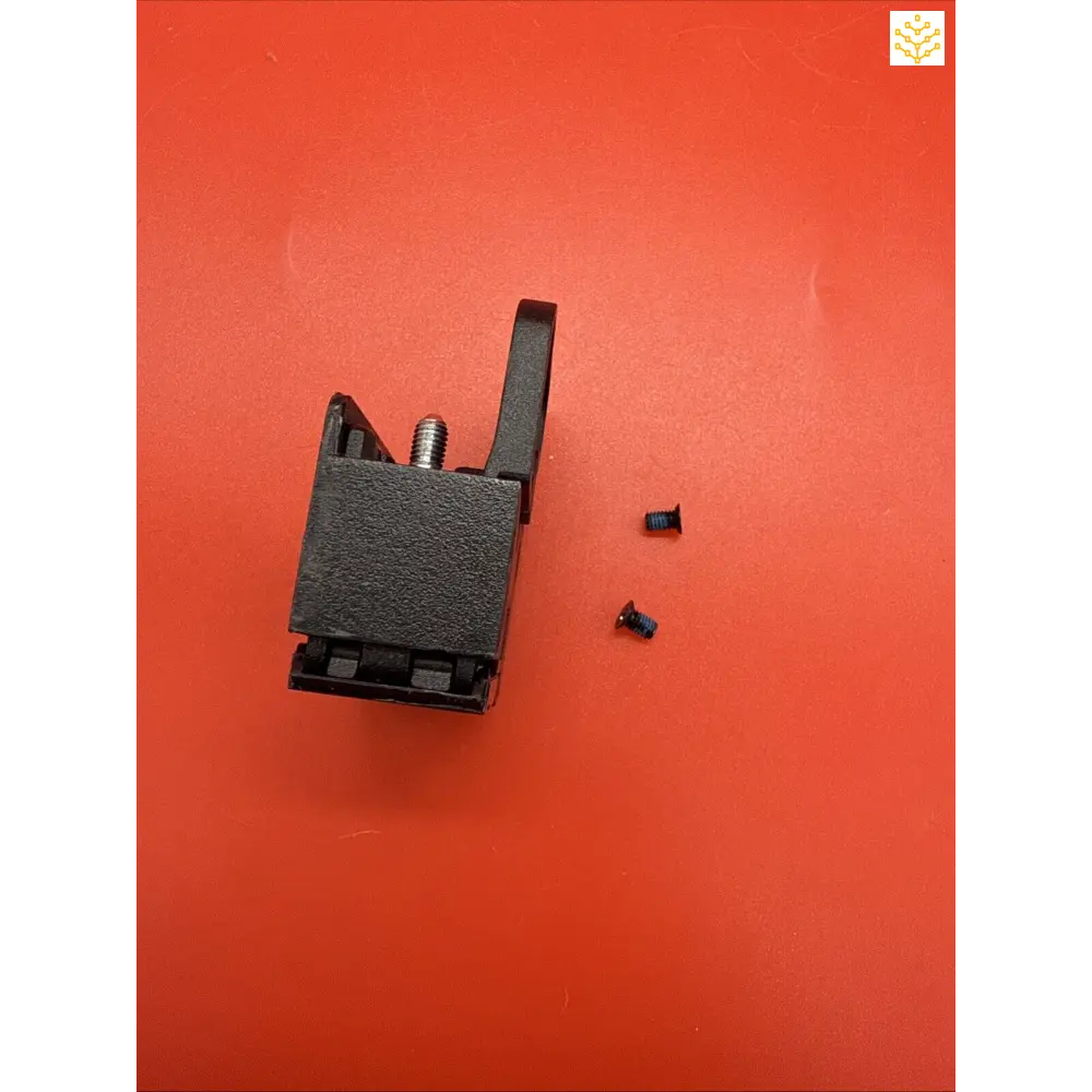 Black plastic electronic connector with two small screws beside it.