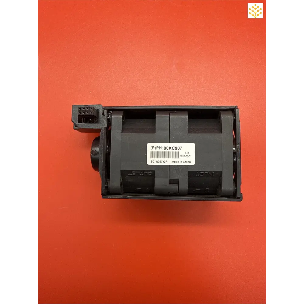 Black plastic electronic control module or junction box with a connector port.