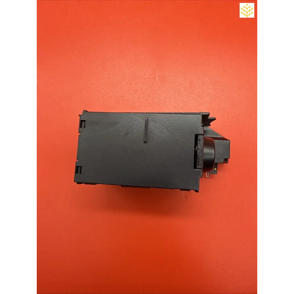 Black plastic electronic component or module with a cylindrical protrusion on one side.