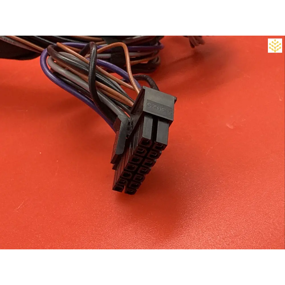 Electrical wiring harness connector with multiple colored wires.