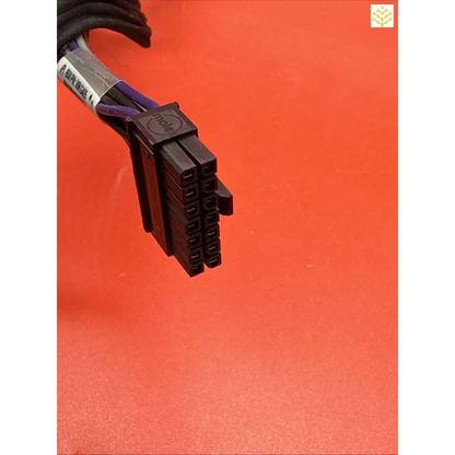 Black electrical connector with multiple pins and wiring.