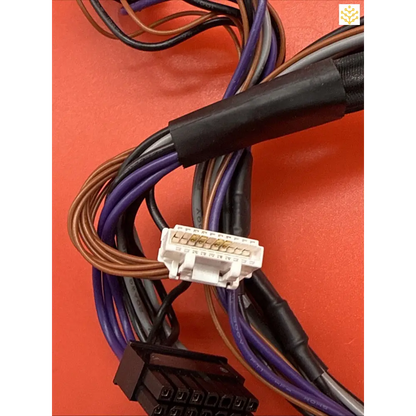 Bundled electrical wires connected to white and black plastic connectors.