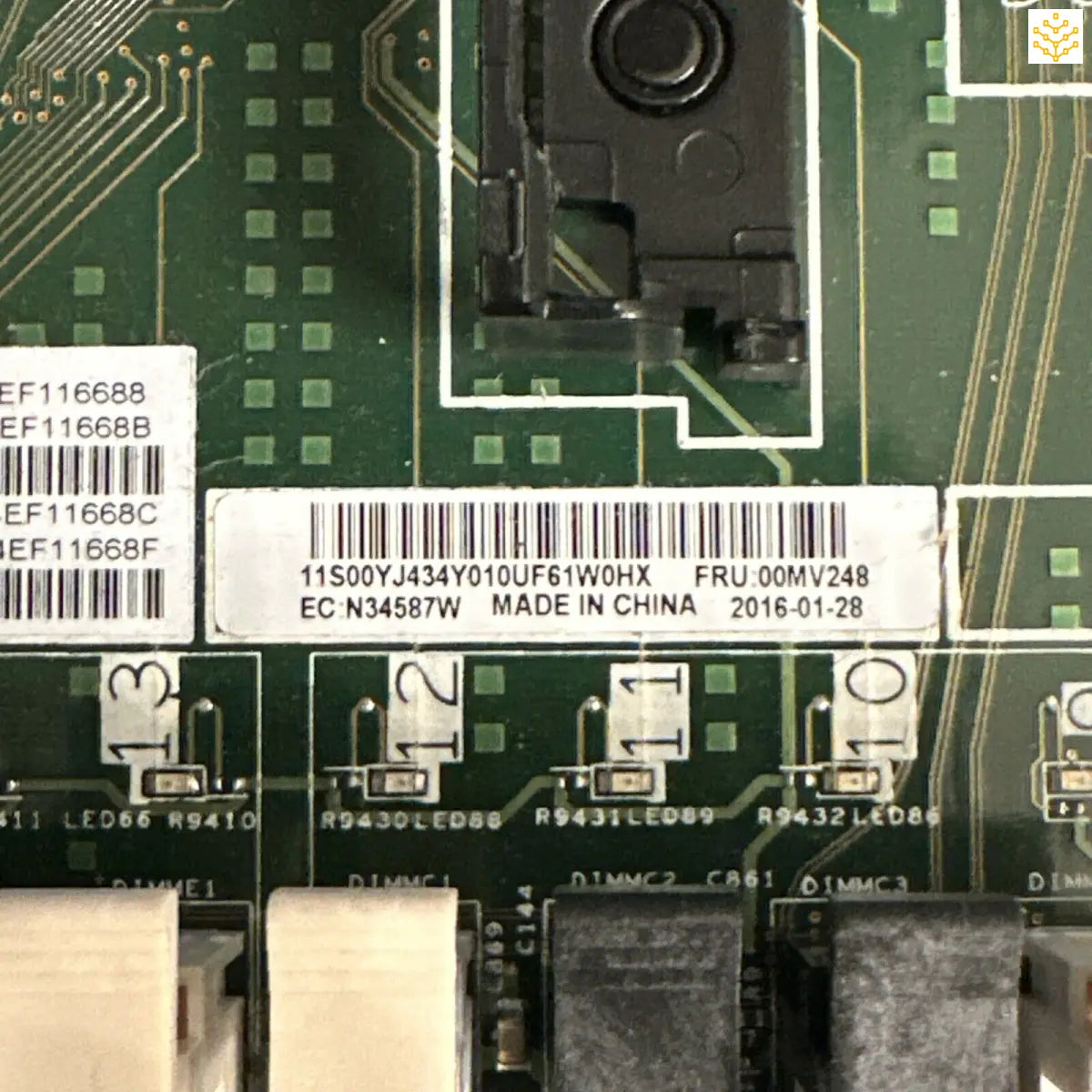 Circuit board with electronic components and printed text showing manufacturing details.