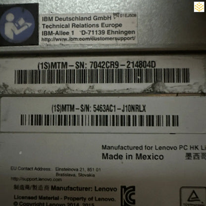 Product label showing IBM Deutschland and Lenovo manufacturing information with serial number barcodes.