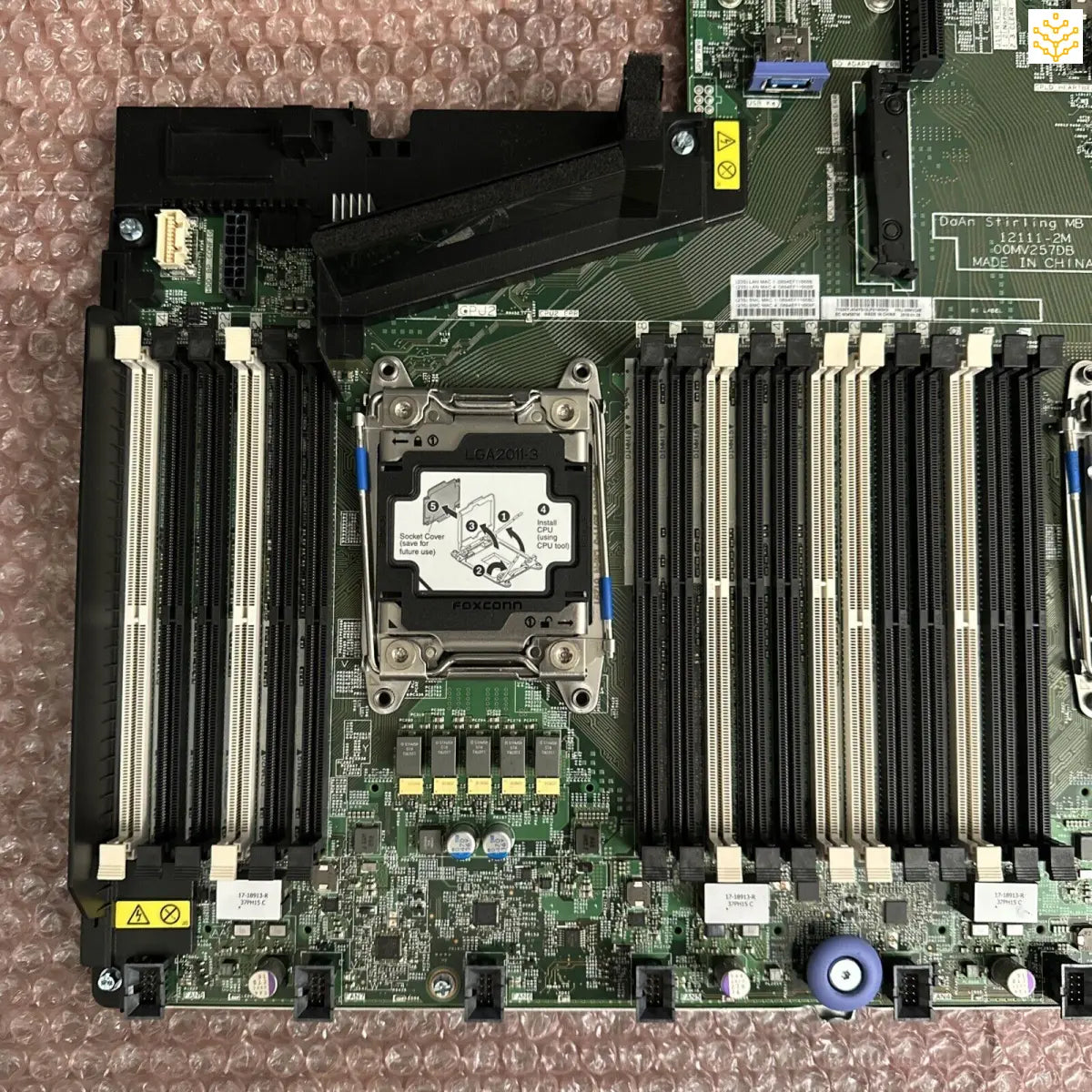 Server motherboard with CPU socket and RAM slots visible.