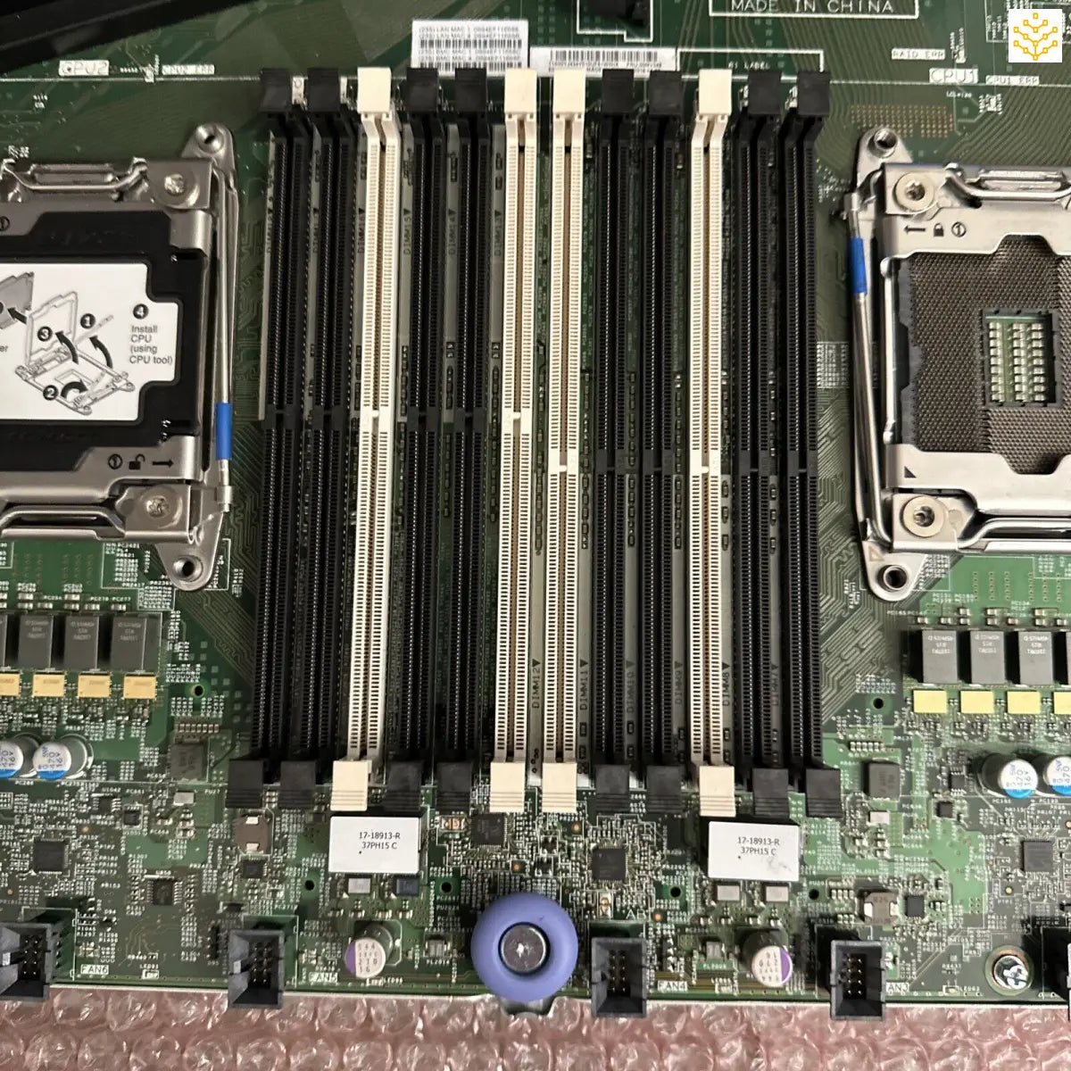 Server motherboard with dual CPU sockets and RAM slots.