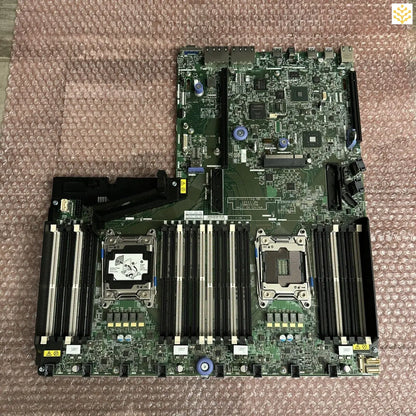 Server motherboard with dual CPU sockets and multiple RAM slots.