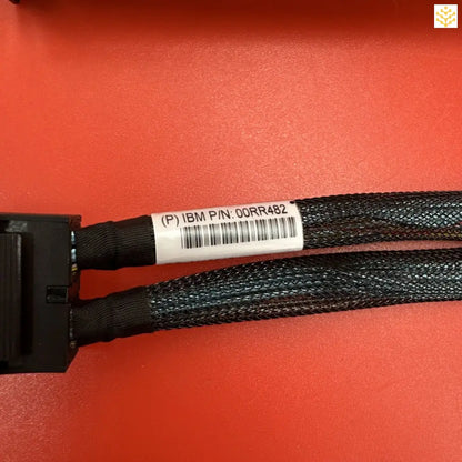 Black braided computer cable with an IBM part number label.