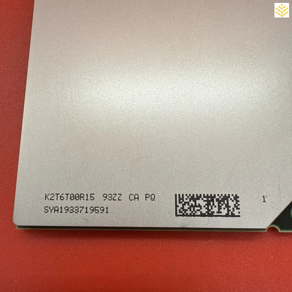 White label with printed text and barcode on it.