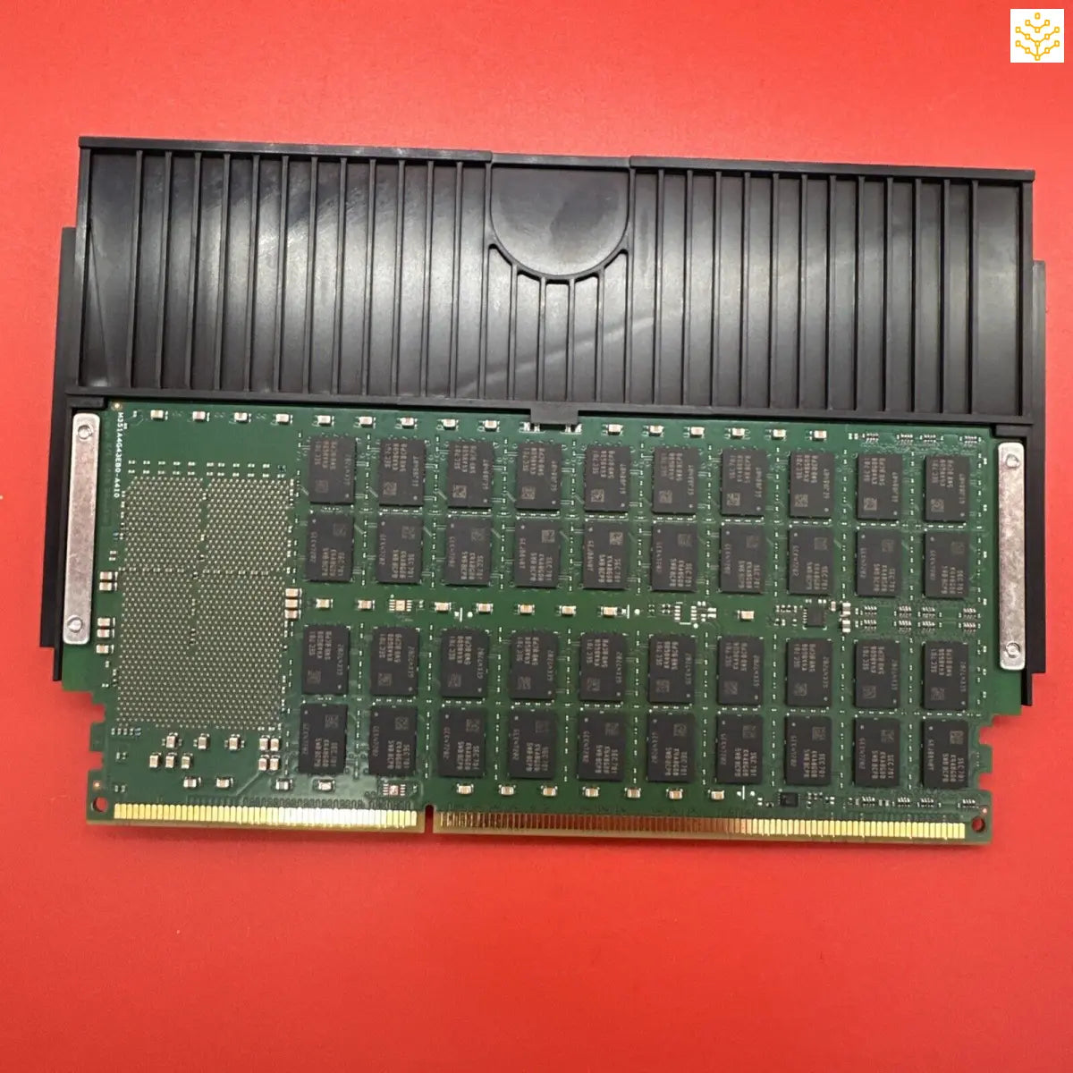 Computer RAM module with heat spreader and exposed circuit board.