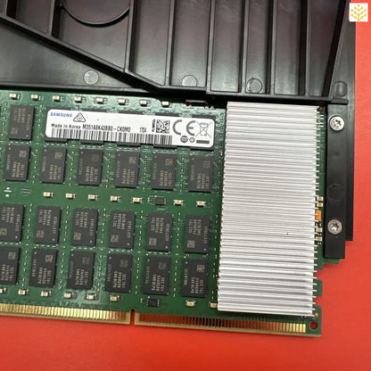 Computer RAM module with a heat sink attached.