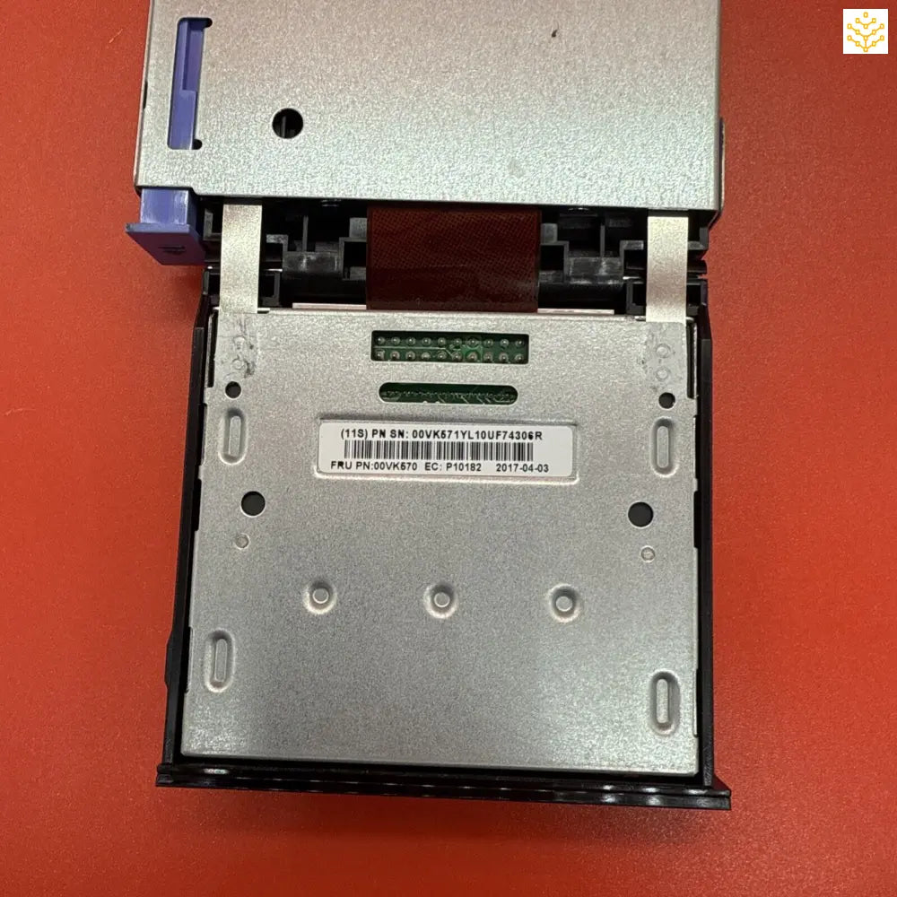 3.5-inch floppy disk drive mechanism with metal casing.