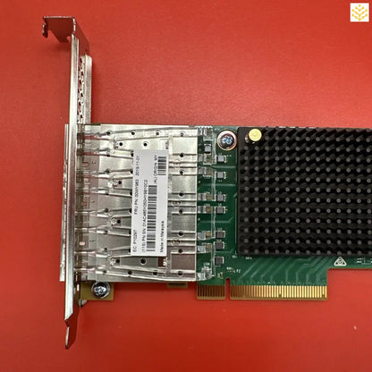 Network interface card with multiple ports and a heat sink.