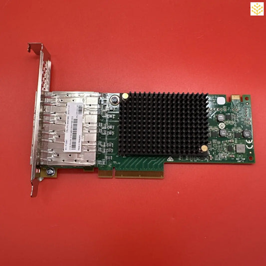 Computer network adapter card with multiple ports and a heat sink.