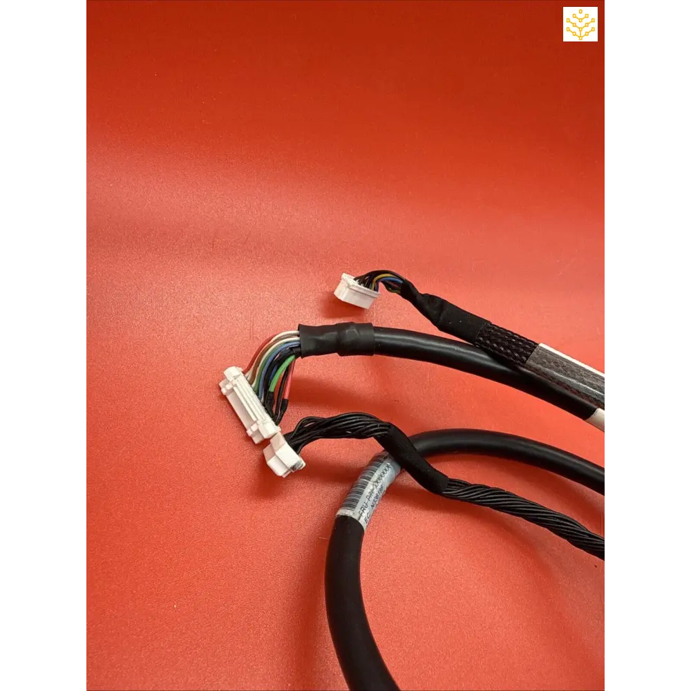 Black cables or wiring with metallic connectors at the ends.