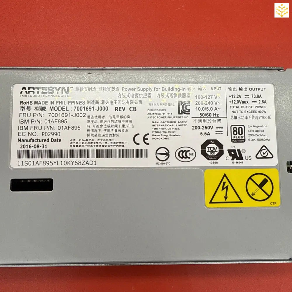 Power supply unit with manufacturer label Artesyn and various certification markings.