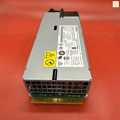 Server power supply unit with warning label and circuit board connector.