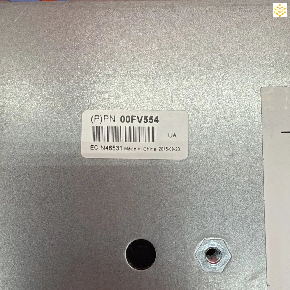 Metal plate with a barcode label and two holes.