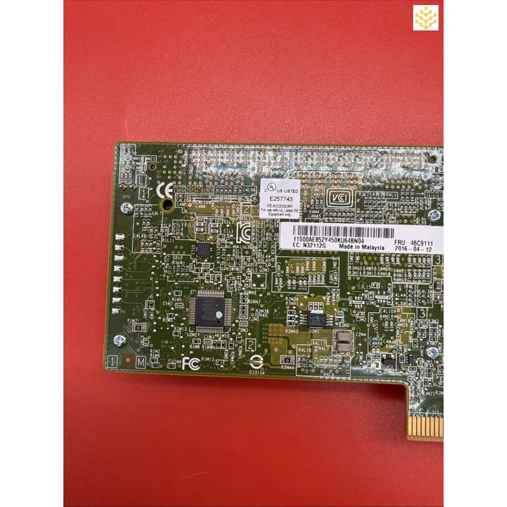 Circuit board with electronic components and integrated circuits mounted on a green PCB substrate.