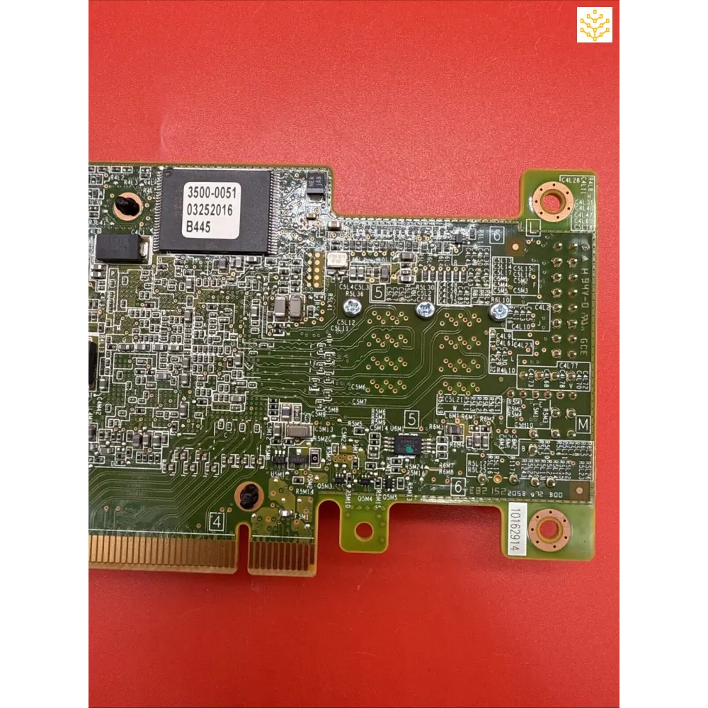 Circuit board with electronic components and integrated circuits mounted on a green PCB substrate.