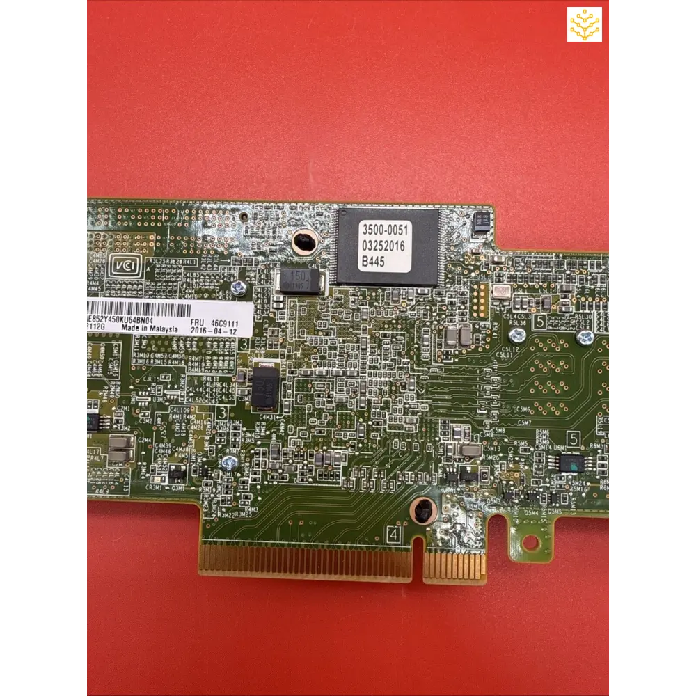 Circuit board with electronic components and integrated circuits mounted on a green PCB substrate.