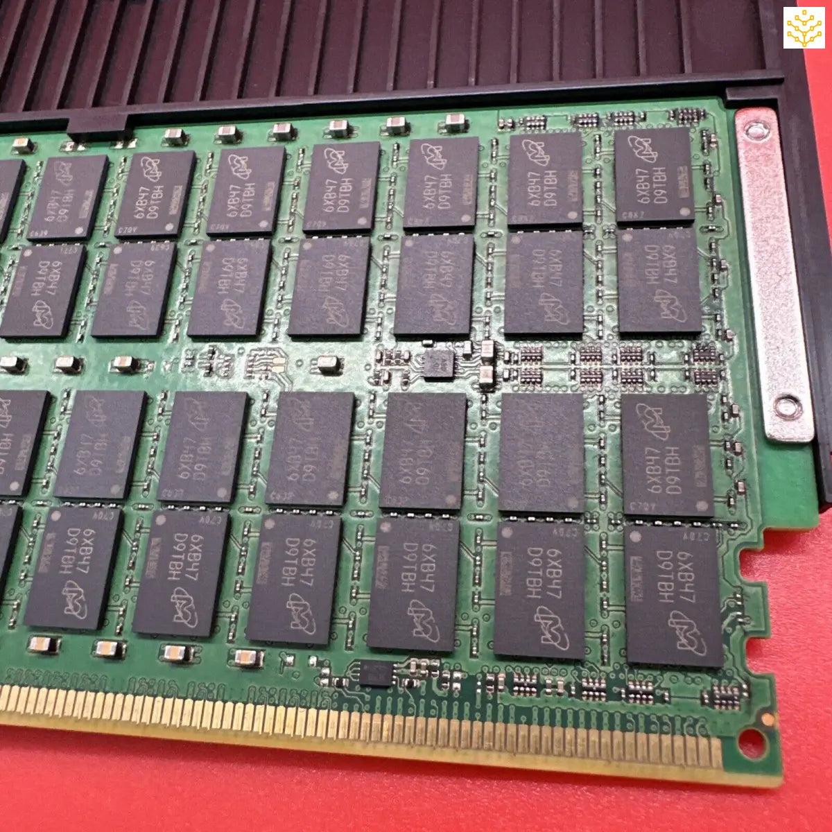 RAM memory module with visible memory chips on a green circuit board.