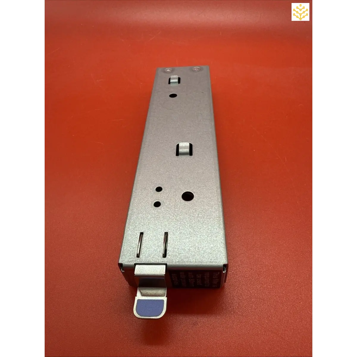 Silver metallic power supply unit with mounting brackets.