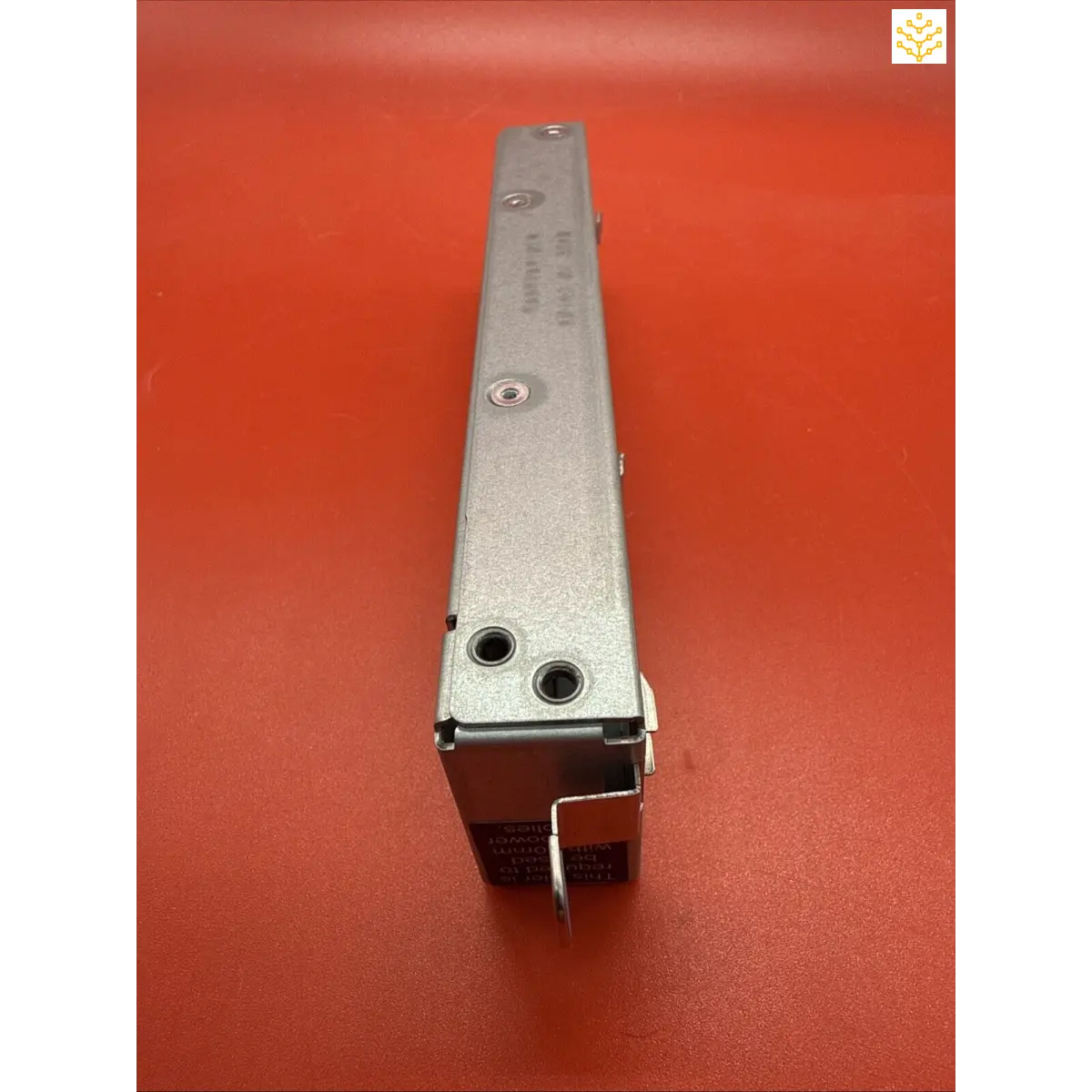 Silver metal door closer mechanism with mounting bracket.