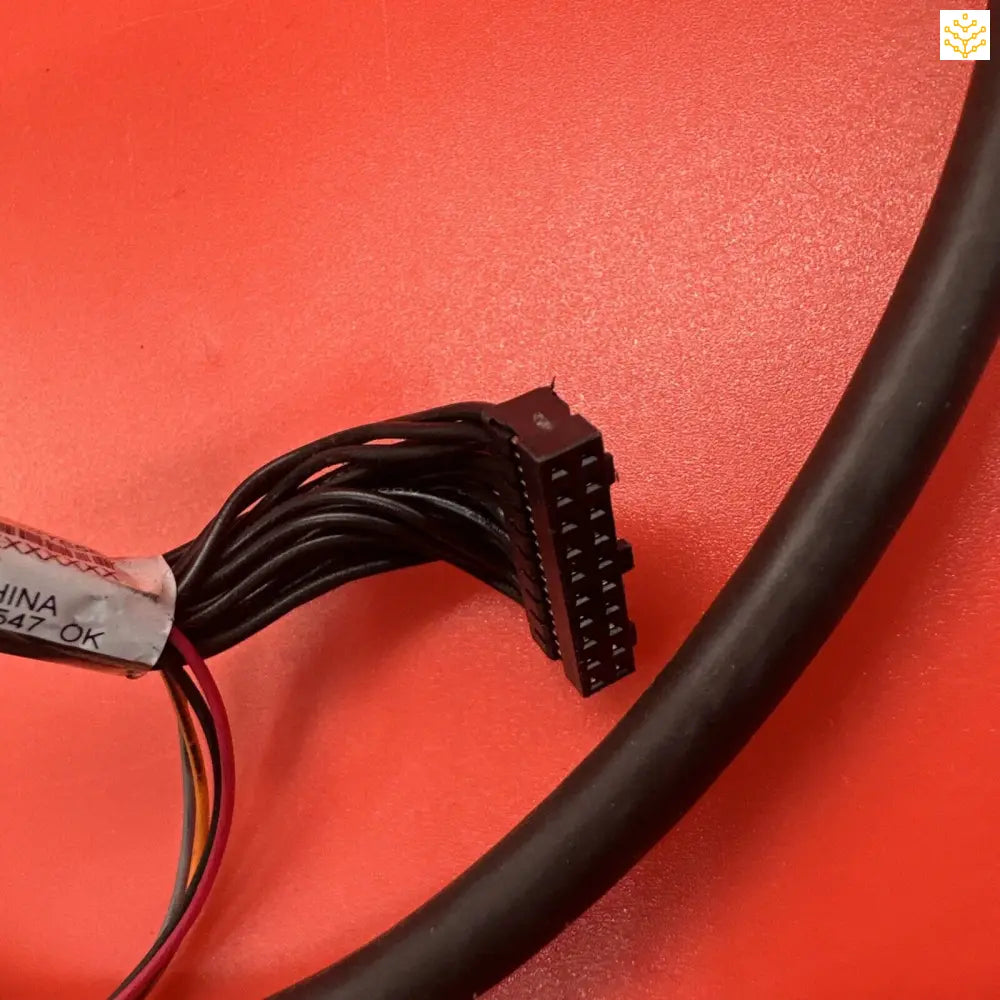 Black electrical connector with multiple wires attached.