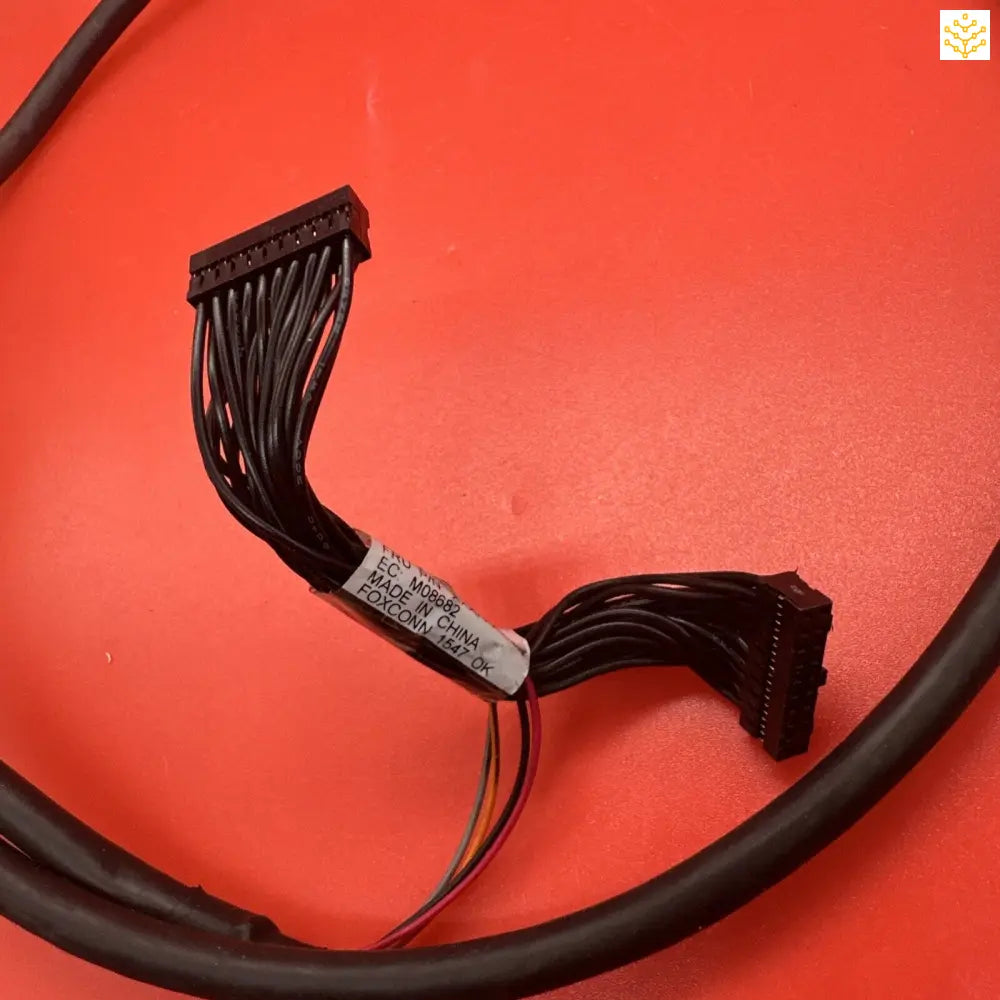 Black multi-wire computer cable connector with split ends.