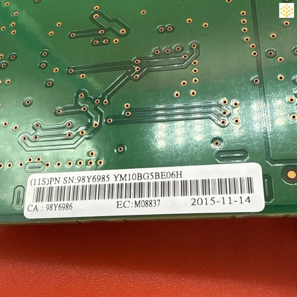 Circuit board with visible copper traces and solder points on a green substrate.