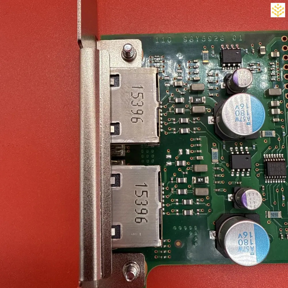 Circuit board with dual ethernet ports and electronic components.