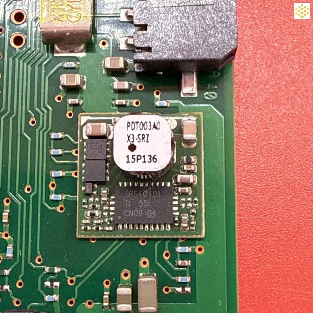 Circuit board with electronic components and visible integrated circuits mounted on a green PCB.