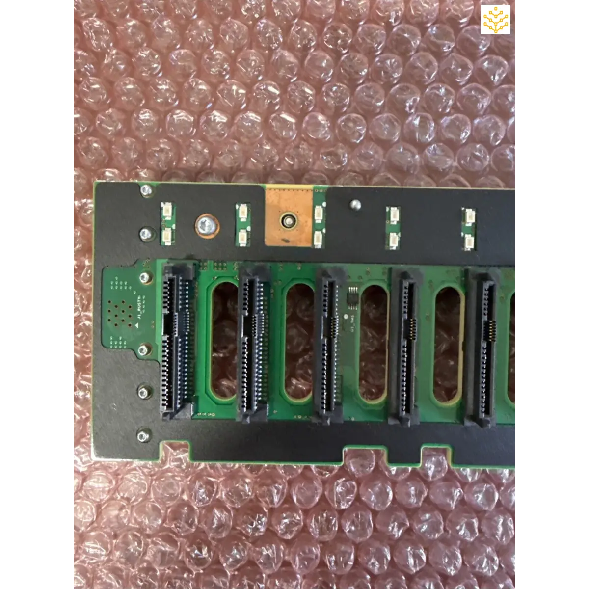 Circuit board with multiple parallel expansion slots or drive bays.