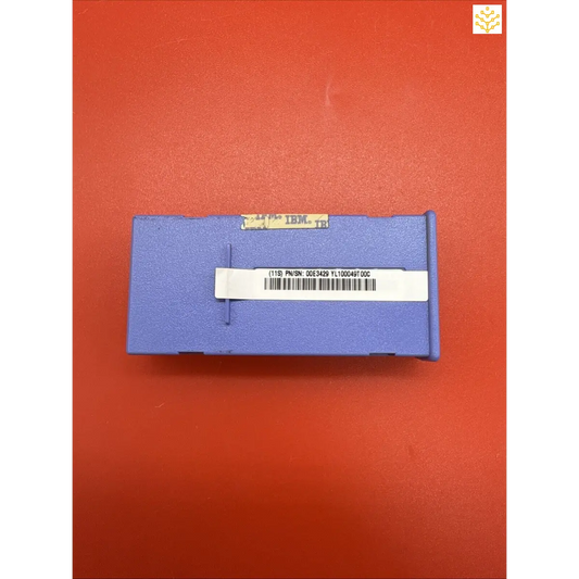 Blue rectangular plastic storage box with barcode labels.