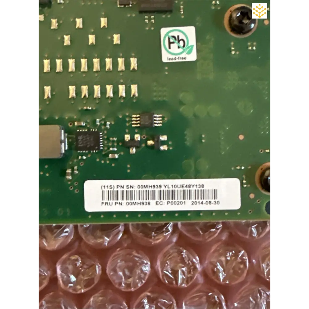 Green circuit board with electronic components and a ’Pb’ lead-free manufacturing label.