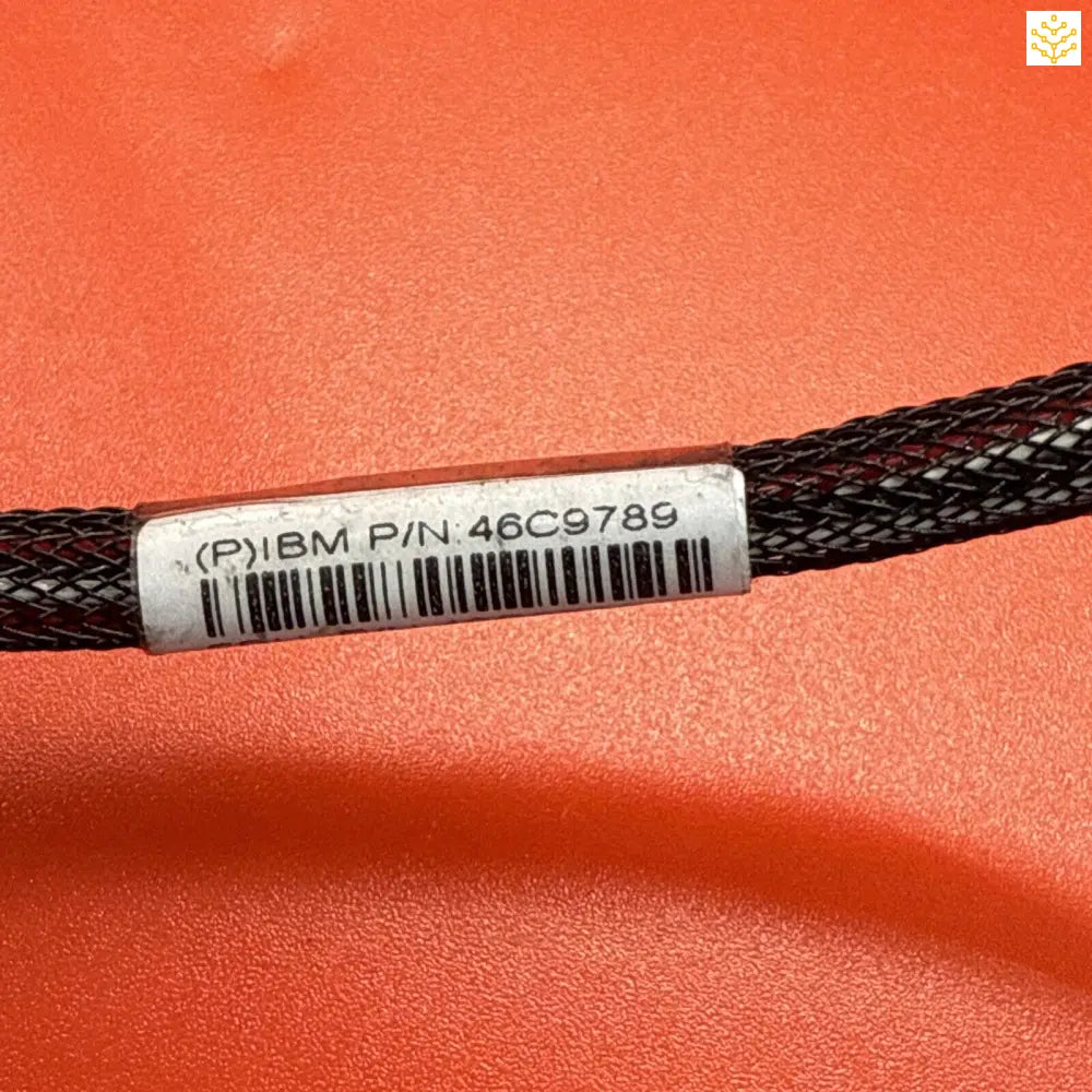 Black braided cable with an IBM part number label.