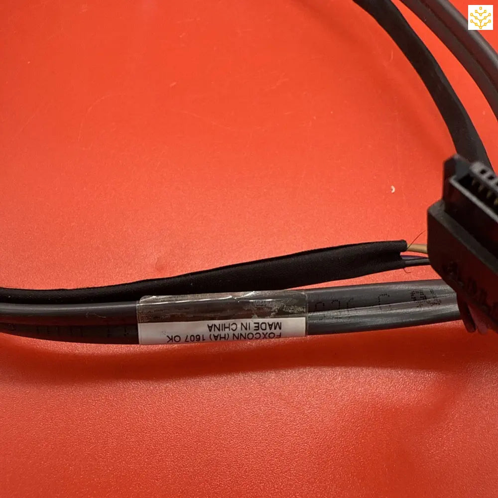 Black electrical cable with printed text label.