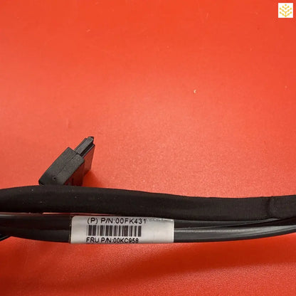 Black USB cable with a barcode label.