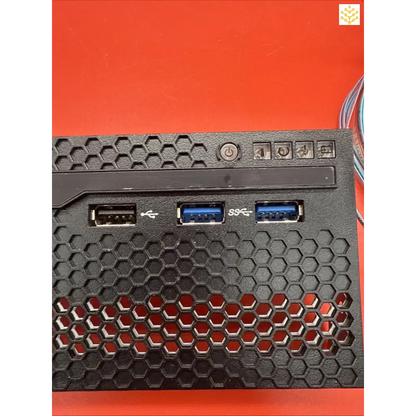 Computer USB hub with a honeycomb pattern design and multiple ports.