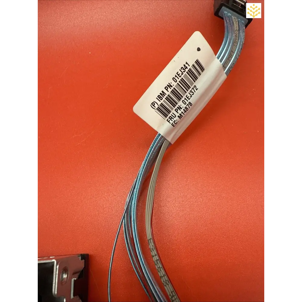 Curved blue-gray cable or wire with a white barcode label attached.