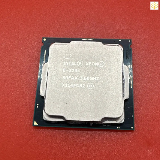 Intel Xeon E-2234 processor chip with visible text on its surface.