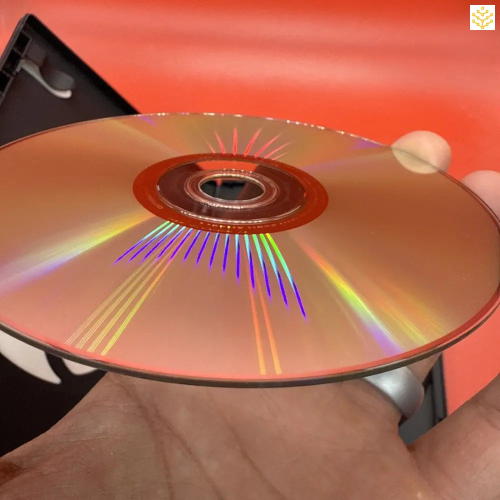 Compact disc (CD) displaying rainbow-like iridescent colors on its surface.