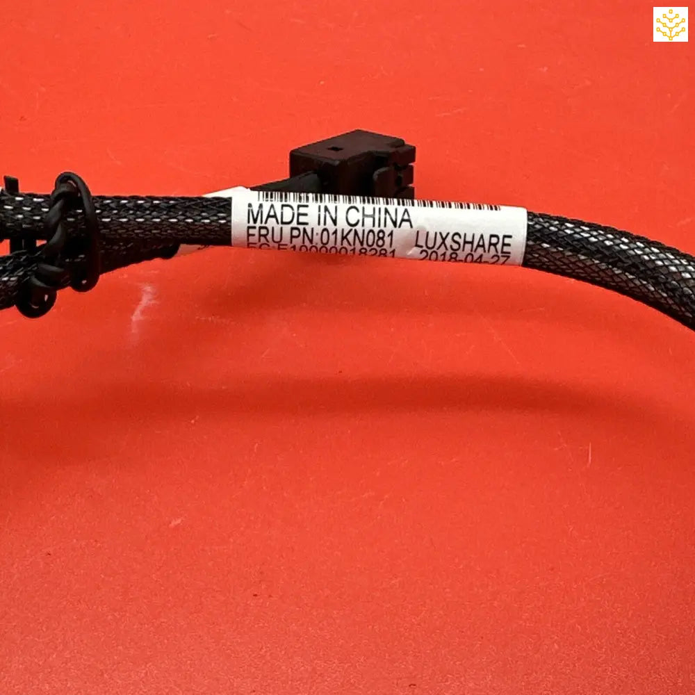 Black braided cable with a white label indicating ’MADE IN CHINA’.